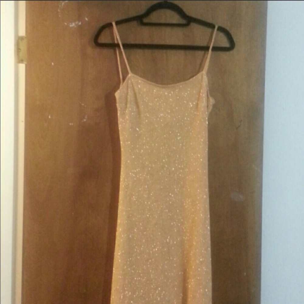 Alexia Admor floor length gold dress.
